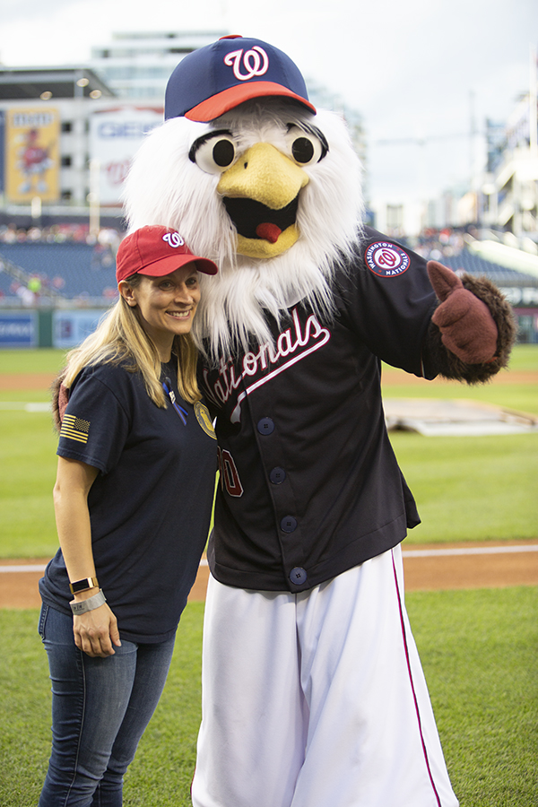 Special Agent Laura Cavillo with the Nationals Mascot.
