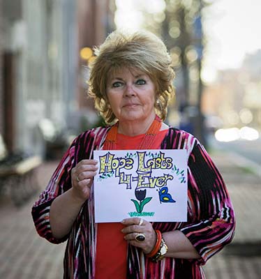 Woman with sign