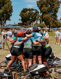 Pedal the Pacific team group hug